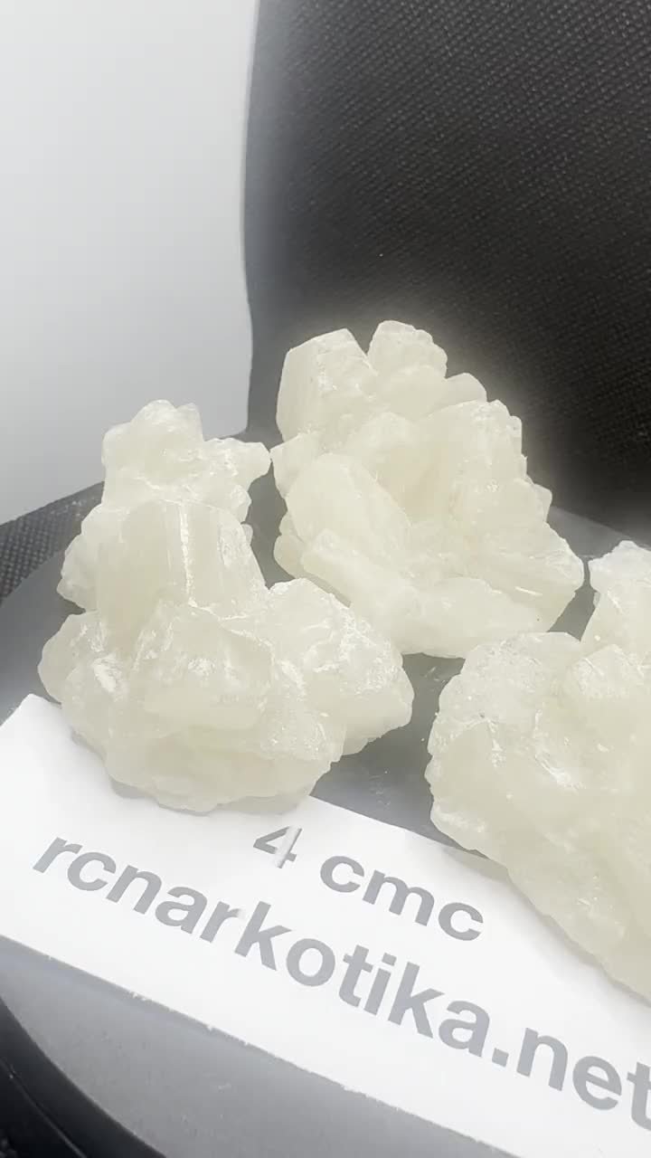 4-CMC crystals with a batch card.